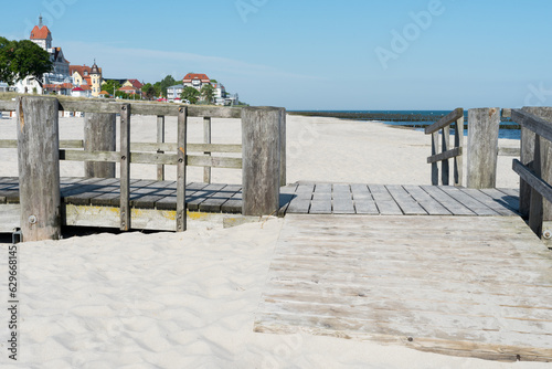 Fototapeta Naklejka Na Ścianę i Meble -  View Jetty at the Baltic Sea on a sunny summer day. The sea and the sky are wonderfully blue	