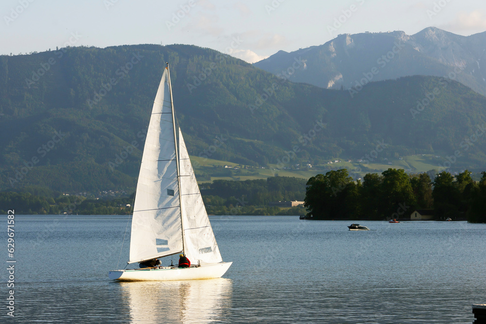 Boat on the Traunsee mountain lake in Austrian Alps. Austria landscape in Salzkammergut region, Europe