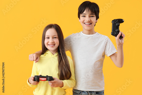 Children with game pads on ...