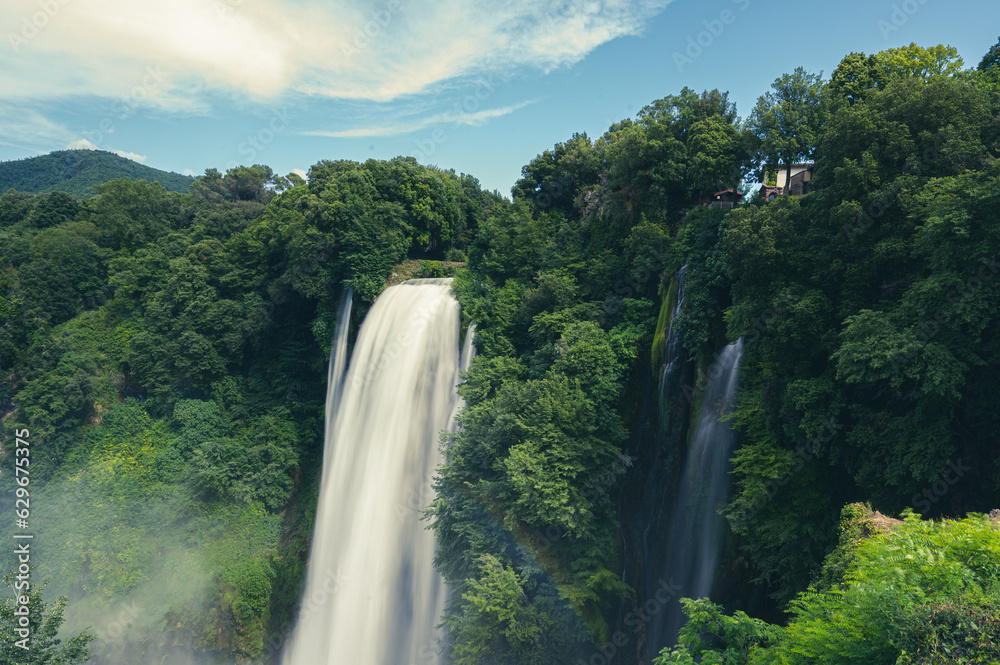 Naklejka premium panoramic view of the Marmore waterfalls, the highest in Europe, in the Umbria region in the province of Terni. They give a sense of power, peace and freshness