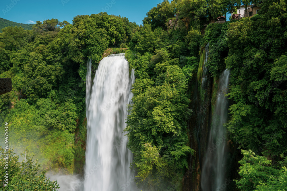 Naklejka premium panoramic view of the Marmore waterfalls, the highest in Europe, in the Umbria region in the province of Terni. They give a sense of power, peace and freshness