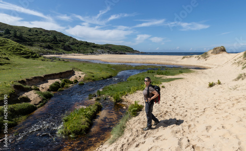 Obraz na płótnie woman hiking on the isle of Colonsay, Scotland w salonie
