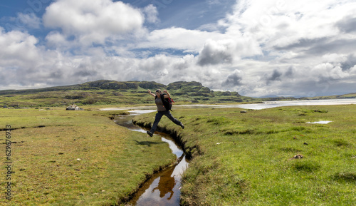 Obraz na płótnie woman hiking on the isle of Colonsay, Scotland w salonie
