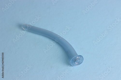 nasopharyngeal airway Isolated in a light blue background  photo