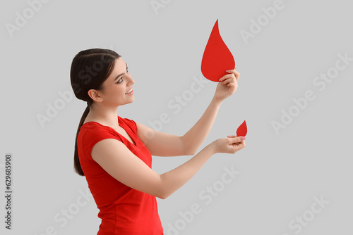 Female donor with paper blo...