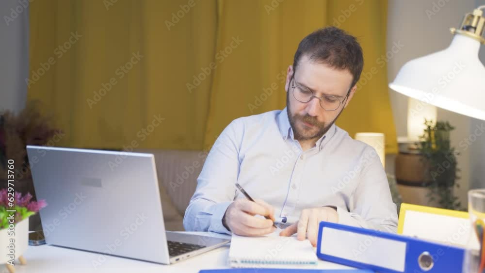Home office worker man working with concentration. Home office worker man working with concentration.