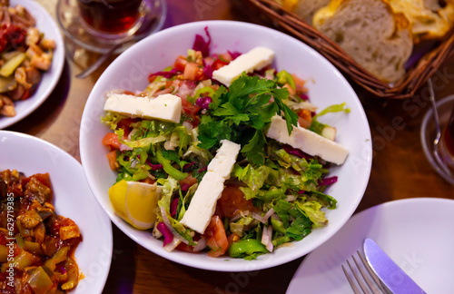 Turkish traditional choban salad on a white plate, turkish food