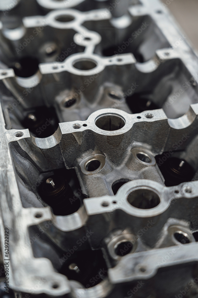 Cylinder head of car under repair Cylinder head of car under repair