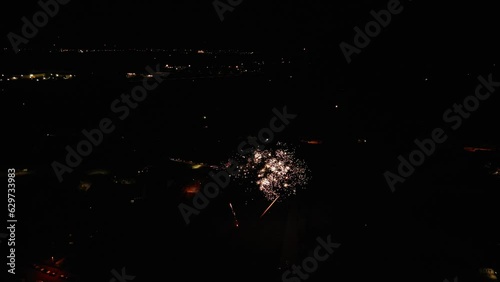 Panoramic drone view of fireworks at the end of Fête des bouviers in Loriol sur Drome, France photo