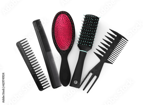 Set of hair brushes and combs isolated on white, top view