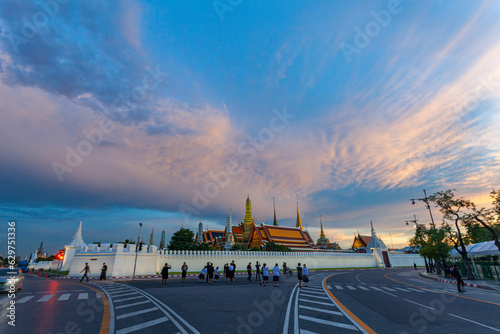.scenery sunset above the beautiful palace..Wat Phra Kaew or Temple of the Emerald Buddha..It is a cultural attraction and an popular landmark or tourist attraction..the beauty of Thai architecture..