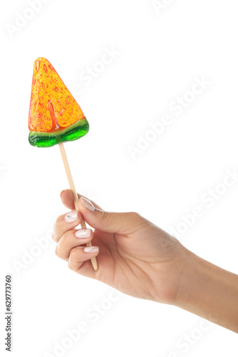 Woman holding lollipop in shape of watermelon slice on white background