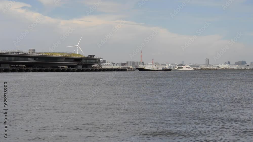 Osanbashi Pier with boats coming and going Osanbashi Pier with boats coming and going
