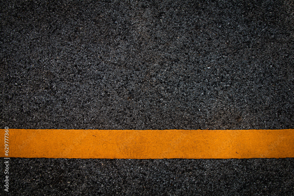 Fototapeta premium Black paved road surface background.