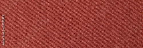 Red fabric texture or background, cotton textile.