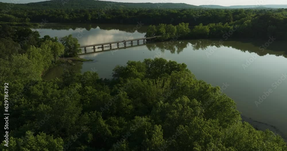 Aerial View Of Lake Sequoyah Drive Spanning Across Lake Sequoyah In Fayetteville, Arkansas. Aerial View Of Lake Sequoyah Drive Spanning Across Lake Sequoyah In Fayetteville, Arkansas.