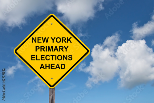 New York Primary Elections Ahead Caution Sign - Blue Sky Background