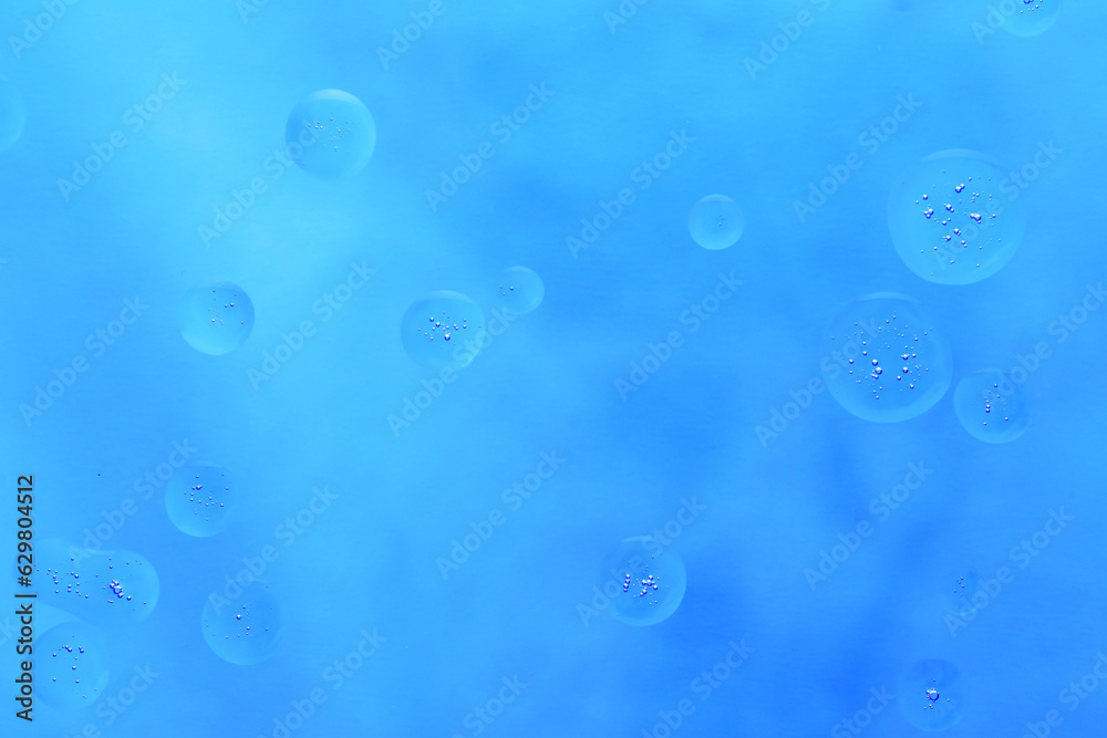 Abstract blue liquid bubble texture background