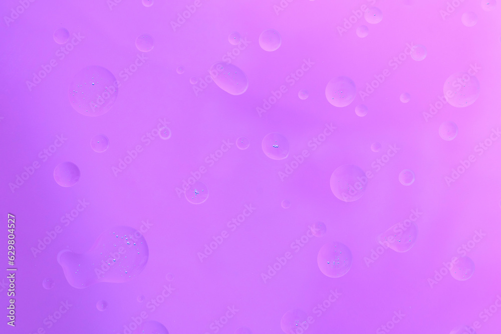 pink water drops on glass background
