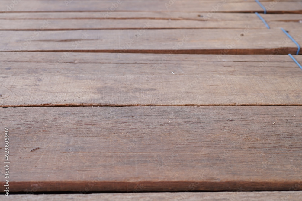 Obraz premium horizontal wooden floor with blue rope, Wood texture background, copy space