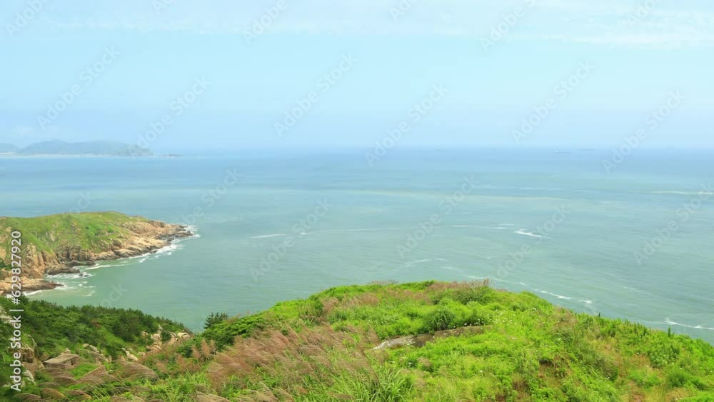 Misty Shengshan island in Zhoushan Archipelago time lapse.Because the whole village is uninhabited, the outer walls of the houses in the village are covered with ivy,so it is called the Wizard of Oz.