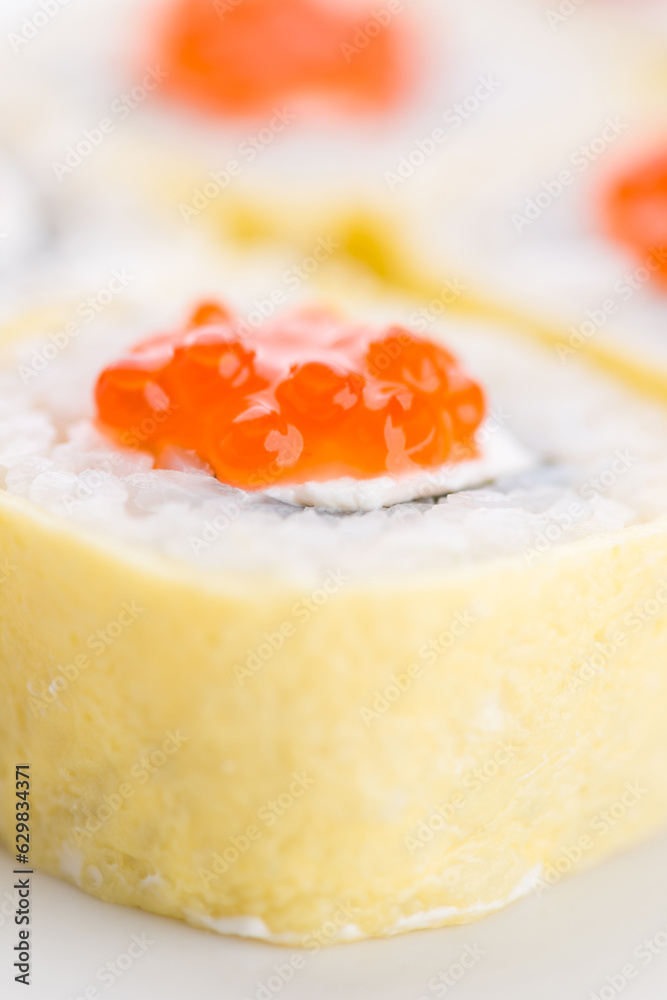 Sushi set and composition at white background. Japanese food restaurant, sushi maki gunkan roll plate or platter set. Sushi set and composition at white background. Japanese food restaurant, sushi maki gunkan roll plate or platter set.