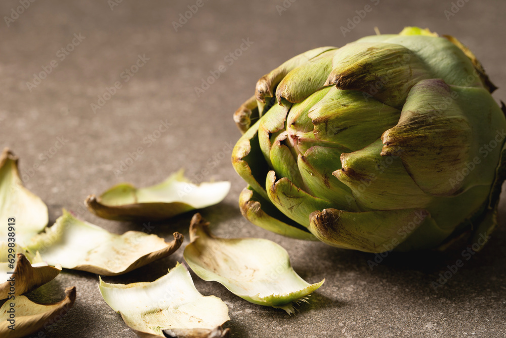 Fototapeta premium Sliced artichokes, food ingredients,cut artichoke plant 