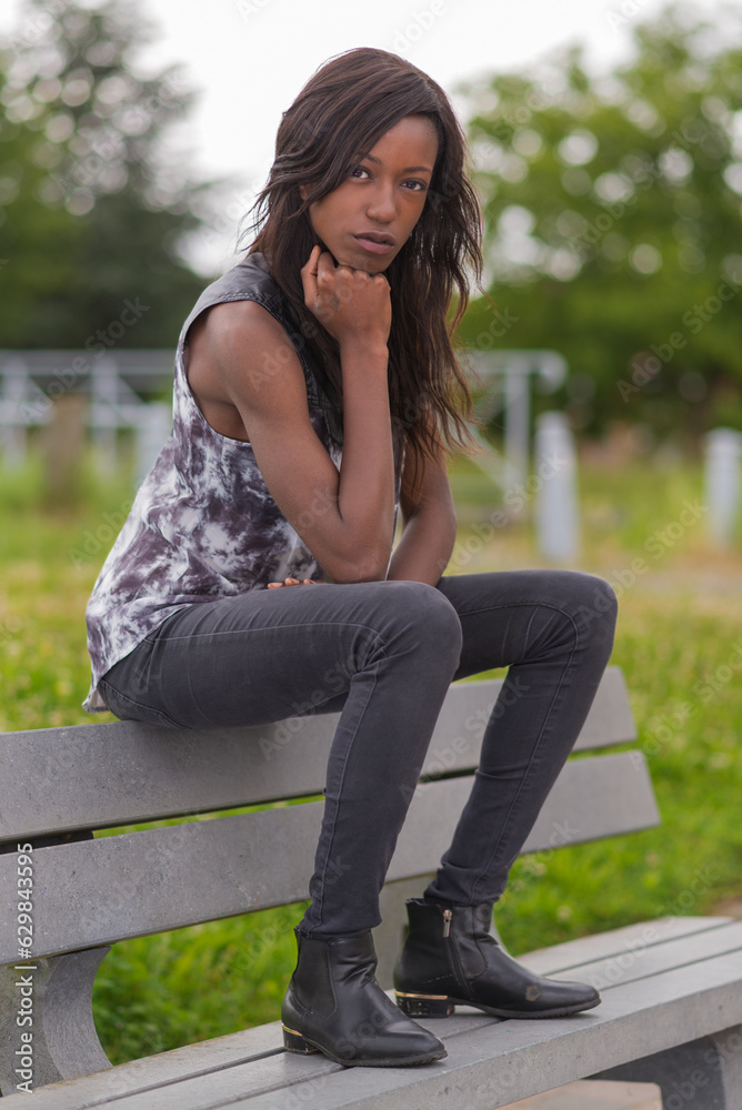woman sitting on a bench woman sitting on a bench