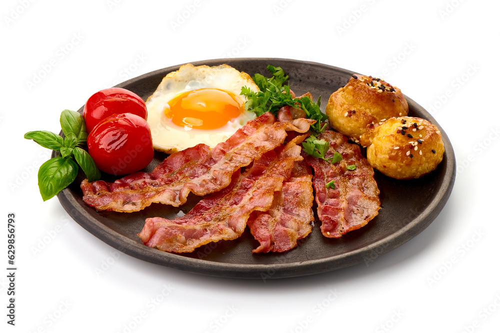 Fried pork bacon with eggs, isolated on white background. Fried pork bacon with eggs, isolated on white background.