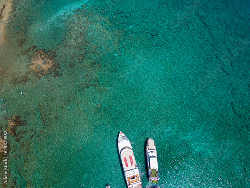 boats on crystal clear water Cyprus