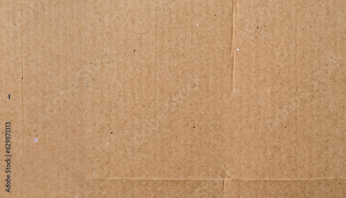 Photos Cardboard sheet texture background, detail of recycle brown paper box pattern
