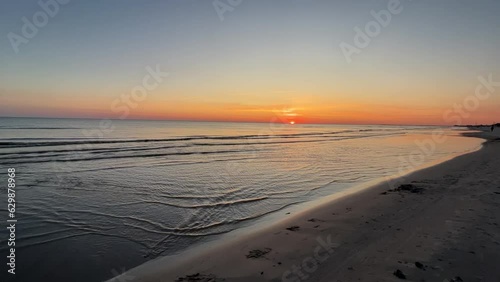 Sunset on the Beach on Summer Day in Lieapaja, Latvia, Europe photo