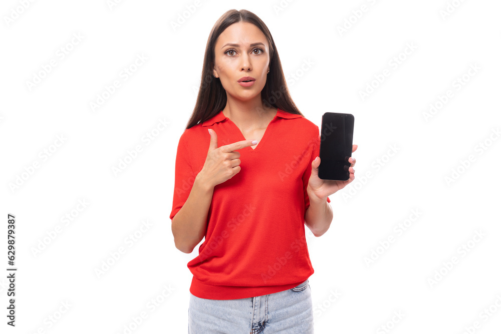30 year old active caucasian woman with straight dark hair dressed in red short sleeve shirt holding phone vertically with mockup 30 year old active caucasian woman with straight dark hair dressed in red short sleeve shirt holding phone vertically with mockup