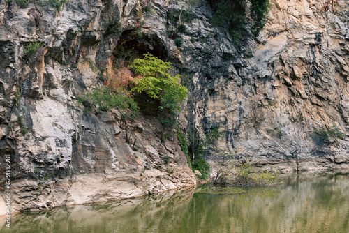 Explore a deep cliff-high canyon in an old, flooded mine. © Tony Ruji