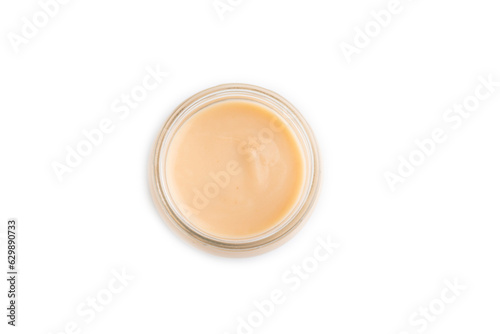 Baby puree with fruits mix, apple, banana infant formula in glass jar isolated on white, top view