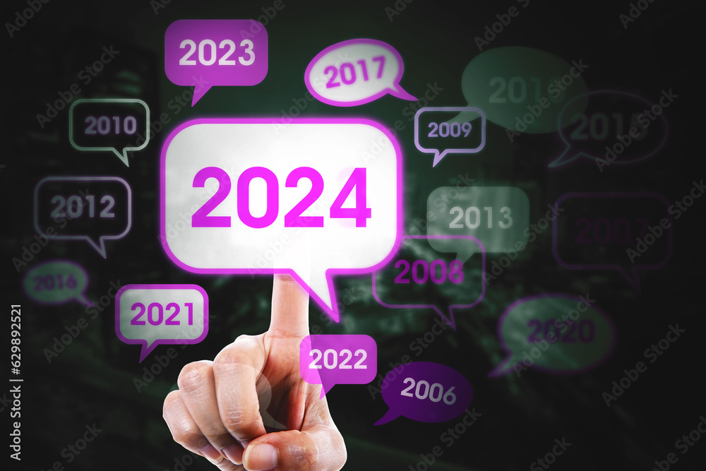 Pointing finger pressing 2024 new year numbers Pointing finger pressing 2024 new year numbers