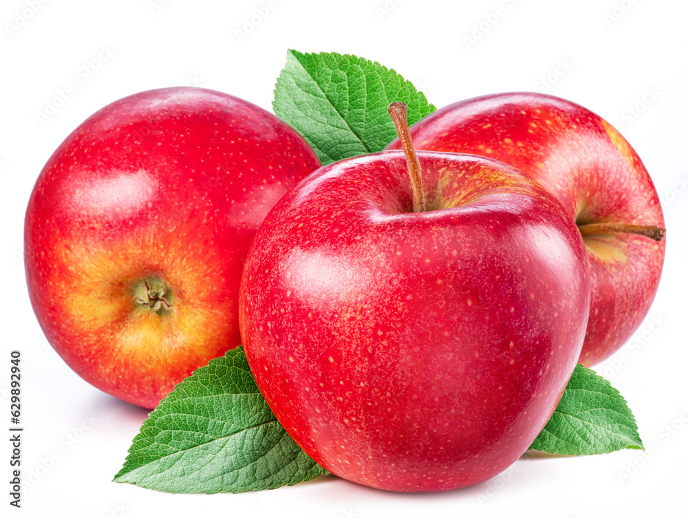 Red apples with green leaves isolated on white background.