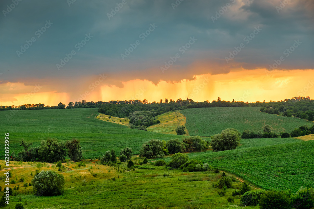 A big cloud over the field.