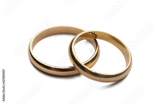 Gold wedding rings isolated on white background