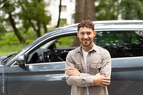Attractive man standing next to his car and about to get in © F8  \ Suport Ukraine