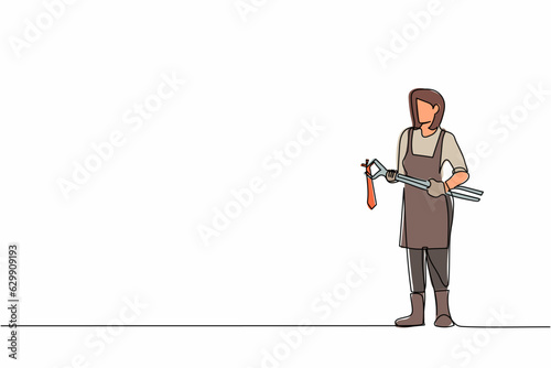 Continuous one line drawing female blacksmith wearing apron standing holding hot blade forged with pliers and tongs. Medieval blacksmith making swords. Single line design vector graphic illustration