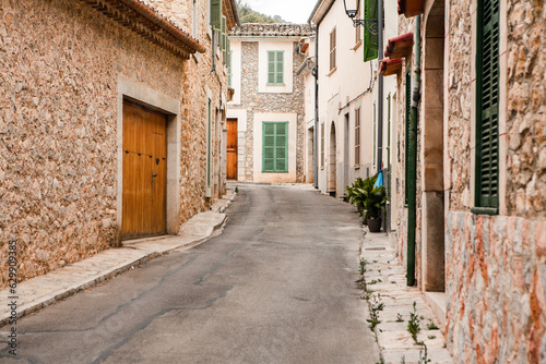 View of a medieval street in the Old Town of the picturesque Spanish-style village Fornalutx  Majorca or Mallorca island