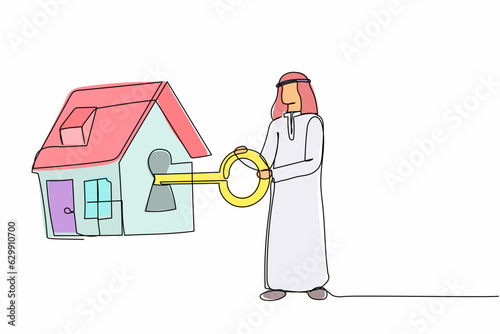 Single one line drawing Arab businessman putting big key into house. Arabian investor investing money in real estate. House loan, property mortgage. Continuous line design graphic vector illustration