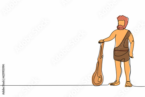 Single one line drawing primitive archaic man dressed in clothes made of animal skin and holding cudgel. Caveman from stone age. Neanderthal hunter. Continuous line graphic design vector illustration