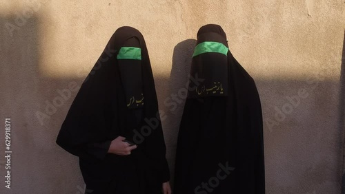 Iranian shiite women with their faces hidden by a veil Khorramabad Iran photo