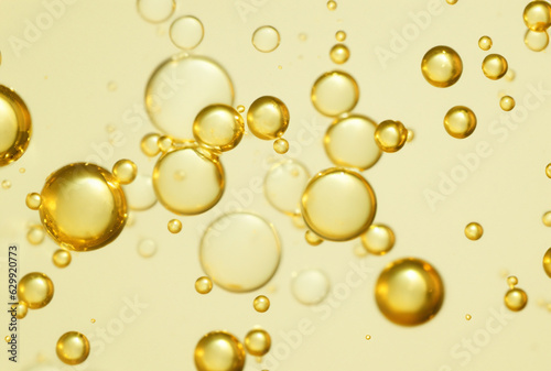 luxury gold cosmetic essence liquid bubbles molecules antioxidant of liquid bubble