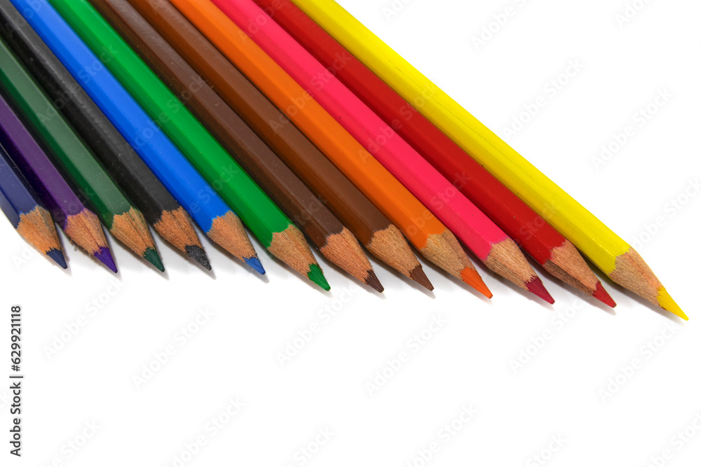 Colored pencils isolated on a white background. Back to school and kindergarten concept. Colored pencils isolated on a white background. Back to school and kindergarten concept.