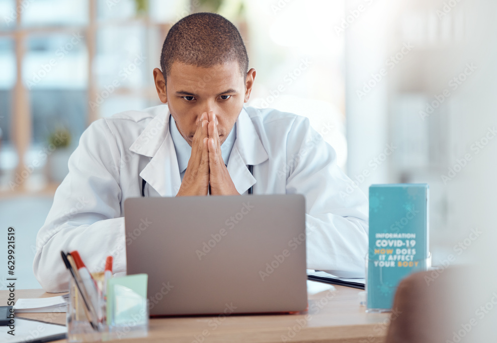 Naklejka premium Hospital, laptop and doctor with covid stress, bad report or Corona issue with negative news, pressure or fatigue. Male person, medical professional or online info with a pc, anxiety or test results