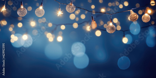 Christmas garland bokeh lights over blue background. Minimalist holiday illumination. AI generated