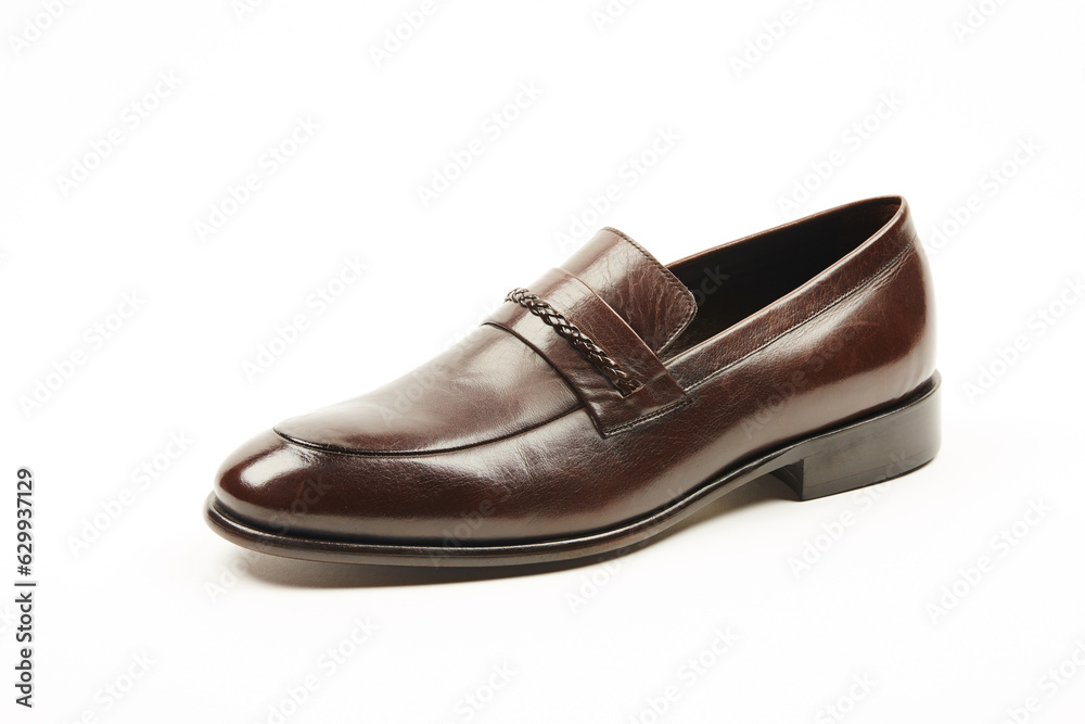 Handmade men's leather moccasins, loafers on an isolated white background. Handmade men's leather moccasins, loafers on an isolated white background.